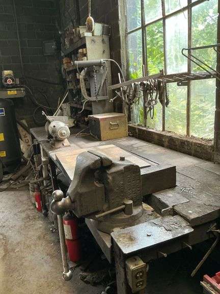 Contents of workbench, 19" x 26" x 2" thick steel block image