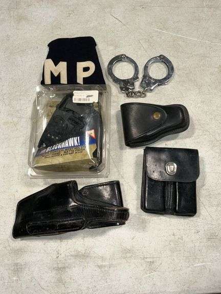 Gun holster, handcuff holster, handcuffs, Blackhawk concealment holster image