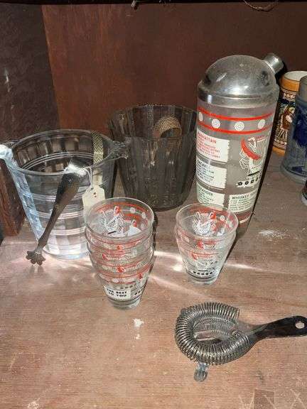 Ice bucket, tongs, strainer, drink mixer, shot glasses image