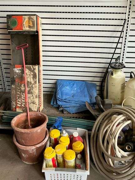 Hedge trimmers, sprayers, tomato stakes image