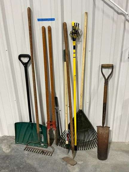Snow shovel, garden rake, post hole digger, leaf rake, etc. image