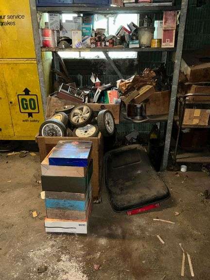 Oil filters, exhaust hangers, starter solenoid, used lawn mower wheels, etc. image