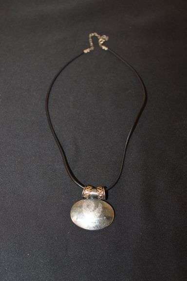 Cord necklace with sterling clasp and Harley Davidson? pendant marked Best image