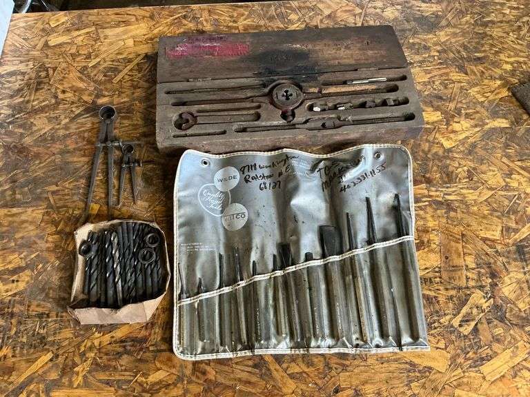 Wilde punch set a couple with damage, drill bits image