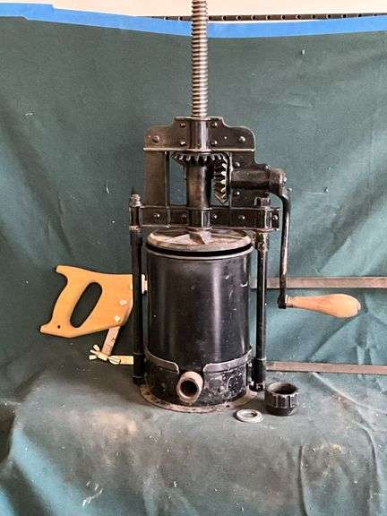Vintage lard press with large plate, small plate, basket and meat saw image