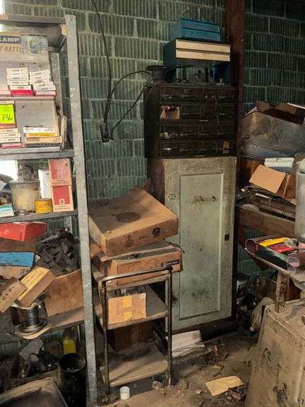 Parts organizers, wooden cabinet with automotive chemicals image