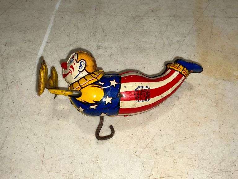 J. Chein & Co. tin wind up clown doing handstands image
