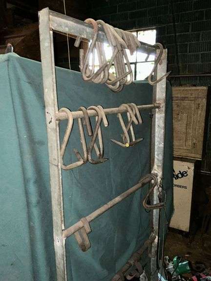 Metal rack with hooks image