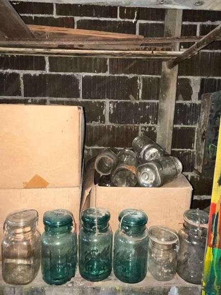 Blue and clear Ball jars with bail lids image