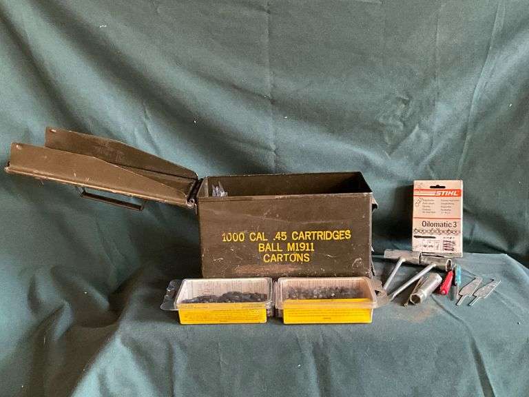 Ammo box with chain saw tools image