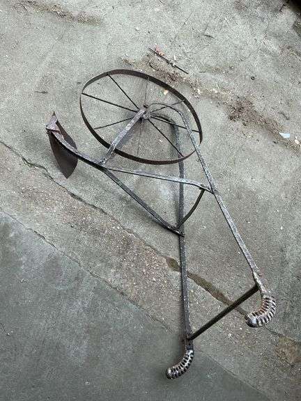 Vintage garden plow. image