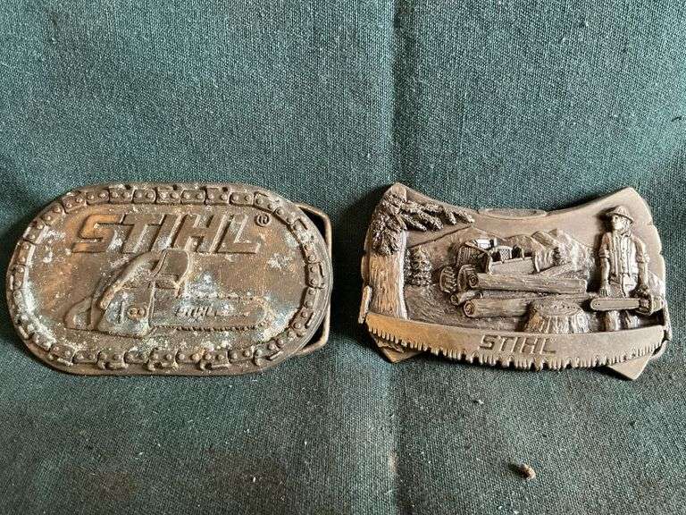 Pair of Stihl belt buckles image