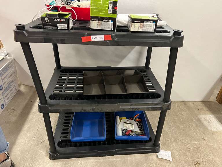 K… BLACK PLASTIC STACKABLE SHELF WITH CONTENT, SEE PICTURES FOR DETAILS