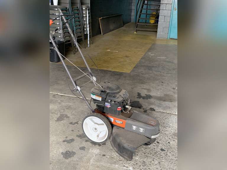 HUSQVARNA PUSH WEED EATER (NEVER BEEN USED) MADE NEED SPARK PLUGS