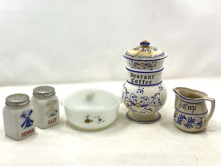 KIT… Vintage kitchenware to include a Fire-King bowl featuring characters from the comic strip B.C. by Johnny Hart, also includes milk glass salt and pepper shakers with a Dutch windmill design, a vintage Royal Sealy Heritage Instant Coffee Canister and measuring cup, see pictures for details. image