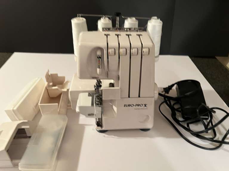 BR4… Euro-Pro serger, comes with footpedal, working condition unknown, see pictures for details. image