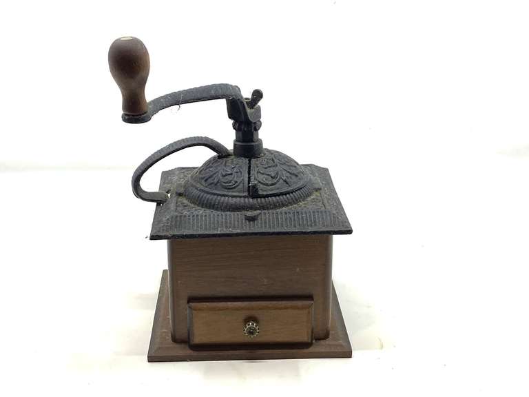 LR… Vintage style manual coffee grinder with wood base, and cast iron top, see pictures for details. image