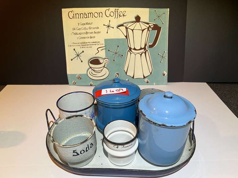 BR4… Vintage enamelware tray with assorted enamelware cups and canisters, see pictures for details. image