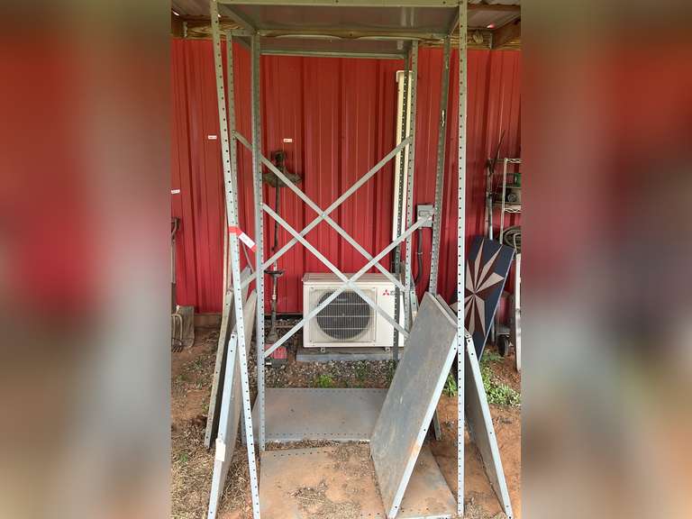 Set of two approximately 6 foot tall metal shelving image