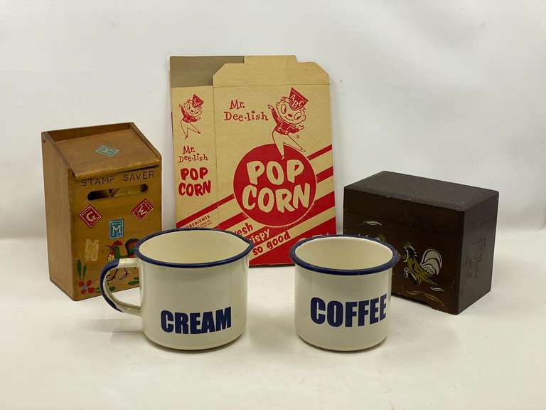 LR… Assorted vintage items to include an enameled metal coffee and creamer cups, vintage grocery store stamp saver with rooster motif, vintage popcorn box, and more. See pictures for details. image