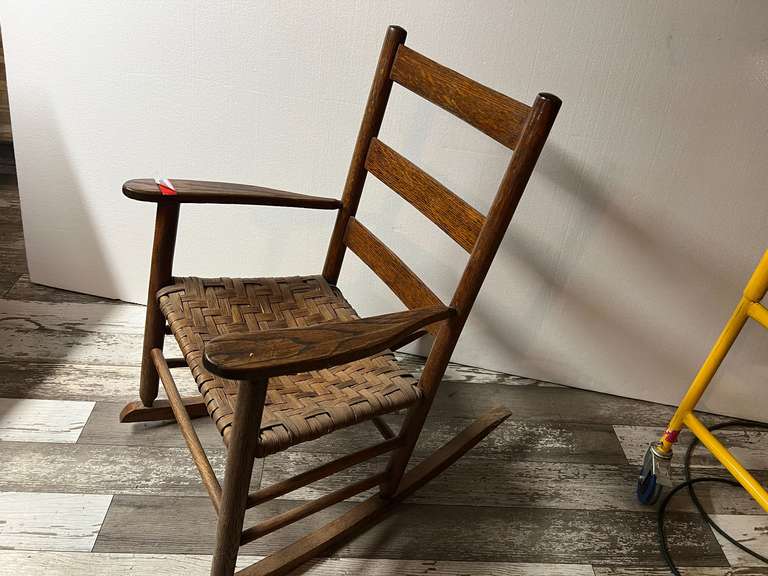 DEN… Antique/vintage wooden rocker with woven seat and ladder back, see pictures for details. image