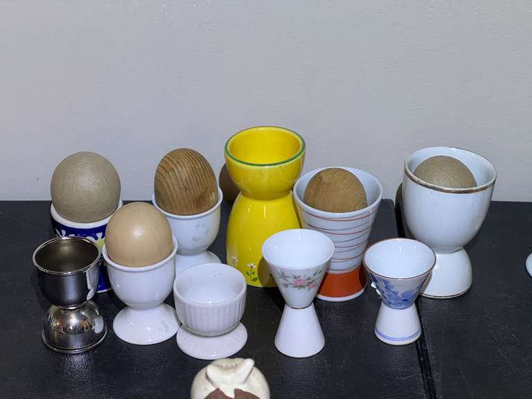 KIT… Large assortment of egg cups, some with faux eggs, see pictures for details. image