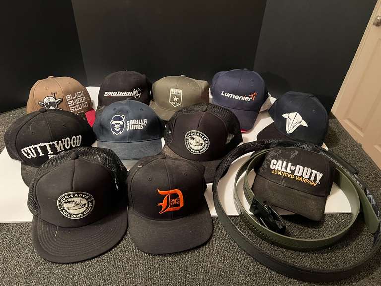 BR2…Assorted caps and holster belts, see pictures for details. image