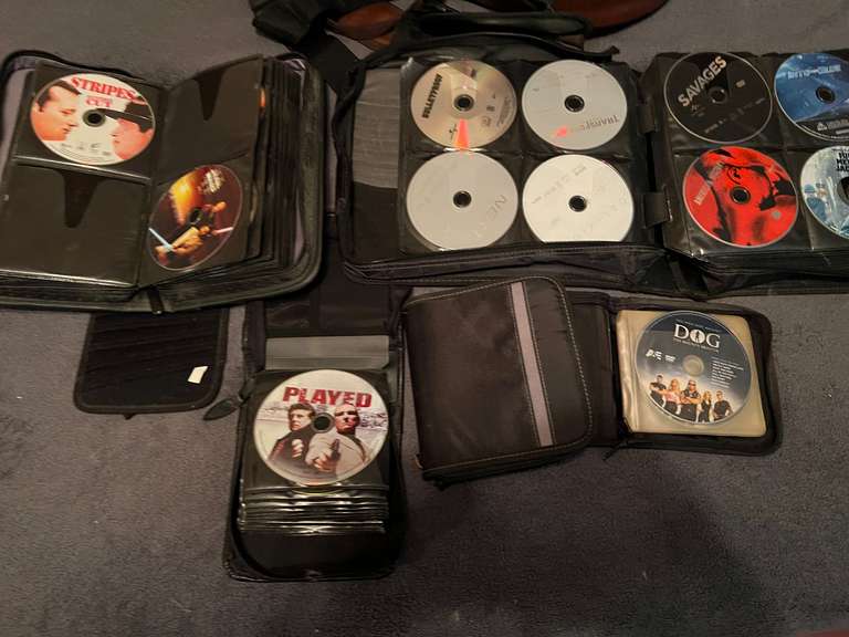 BR2…Large CD/DVD assortment with storage cases, see pictures for details. image