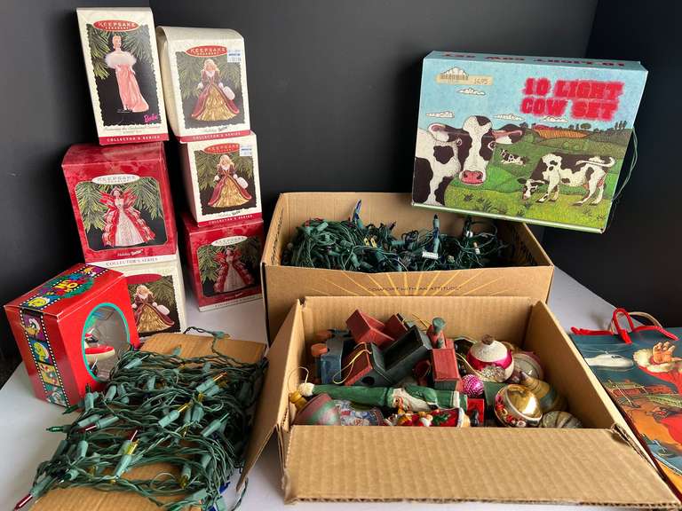Assorted Christmas decor to include ornaments, Barbie ornaments in original boxes, and more. See pictures for details. image