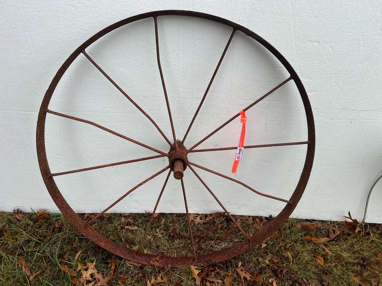 Antique metal wagon wheel image
