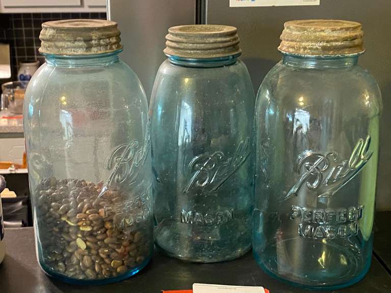 LR… Large blue vintage ball mason jars, metal caps have porcelain lids, three pieces, see pictures for details. image