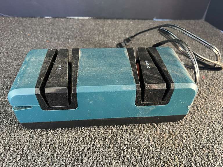 Electric knife sharpener, powers up, see pictures for details. image