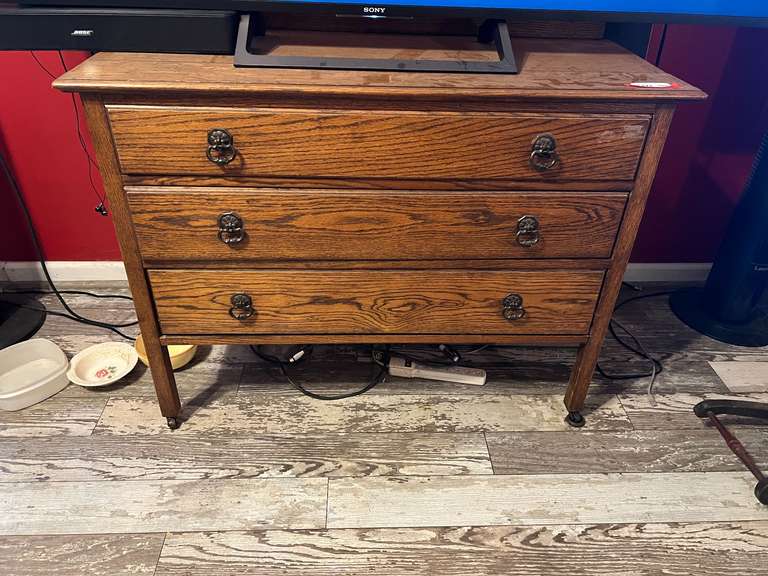 DEN… Vintage rolling three drawer chest, believed to be oak, see pictures for details. image