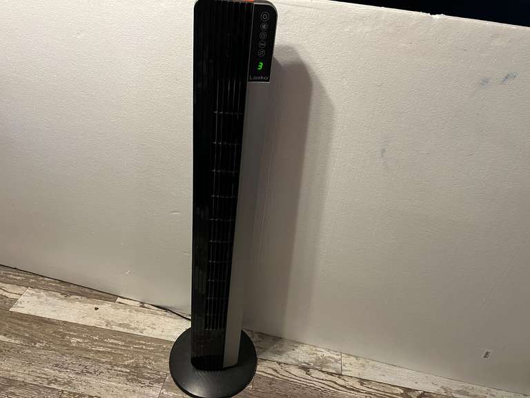 DEN… Lasko tower fan, with remote, powers up, see pictures for details. image