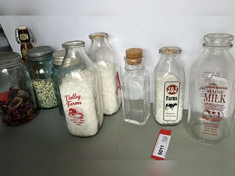 Vintage jars and milk jars, also includes a vintage honey jar with embossed beehive decoration, approximately nine pieces, see pictures for details. image