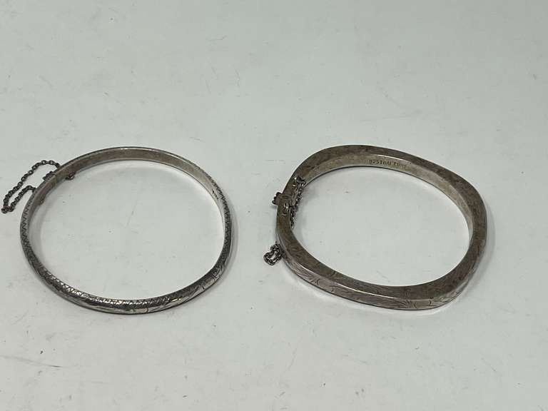 Two silver bangle bracelets, both pieces are stamped 925, see pictures for details. image
