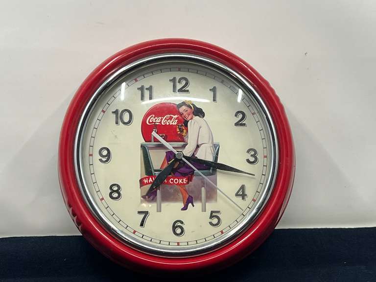 DEN… Metal framed battery powered Coca-Cola clock, see pictures for details. image