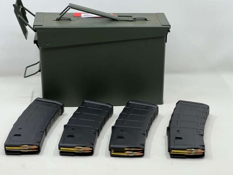 DEN…Ammo box containing four 30 round clips, loaded with some 223 rounds, all clips may not be full, see pictures for details. image