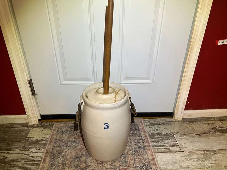 DEN… Stoneware butter churn, 3 gallon, with lid, dasher, and handles. The lid has been broken but repaired, still has a chip, see pictures for details. image