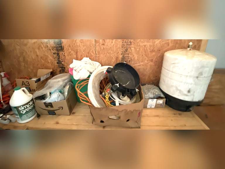 Shelf lot marked 5044, some items include a bucket dolly, extension cord, watering wand, furniture dolly, Planters, APEC Water Tank -14 storage tank, and much more. See pictures for details. image