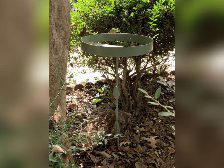 GREEN METAL TALL YARD DECOR, BLACK METAL YARD ART & BLACK HEAVY DUTY GARDEN HOSE - SIDE PORCH image