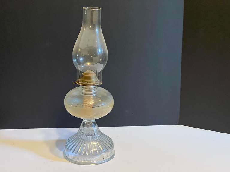 LR… Vintage oil lamp with fluted base and glass chimney, see pictures for details. image