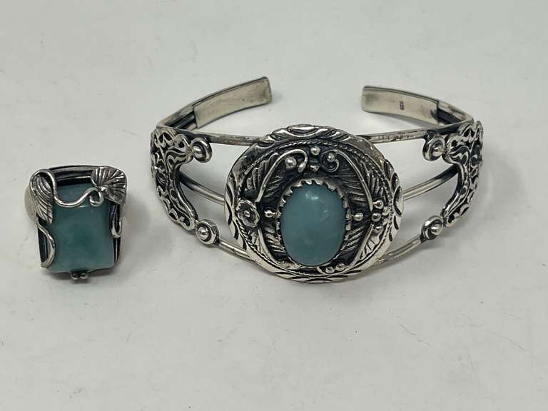 Beautiful sterling cuff bracelet with matching ring, both pieces are stamped 925, stones are believed to be larimar, see pictures for details. ￼ image