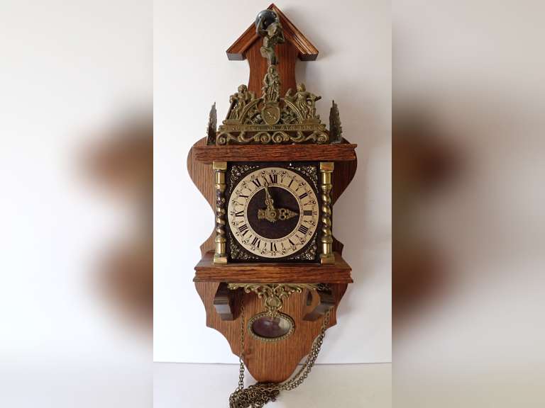 Exquisite Wall Clock with Detailed Ornamentation image