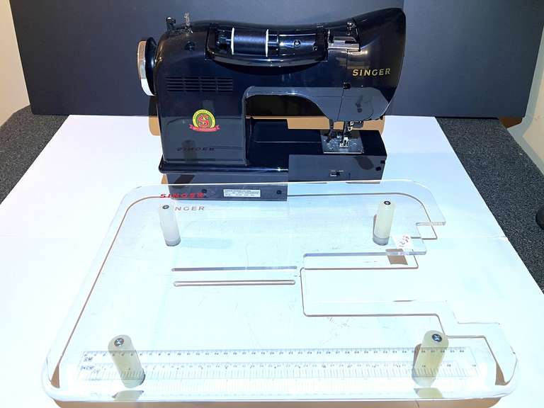 BR4…Singer sewing machine, commemorates 160th anniversary, very gently used, working condition unknown, comes with a stand, see pictures for details. image