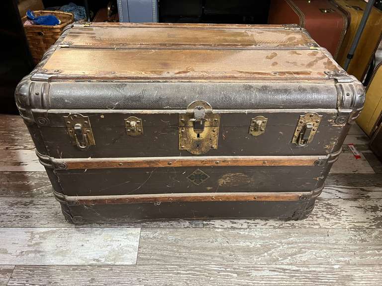 DEN… Antique trunk, handle is broken on one side, with content, see pictures for details. image