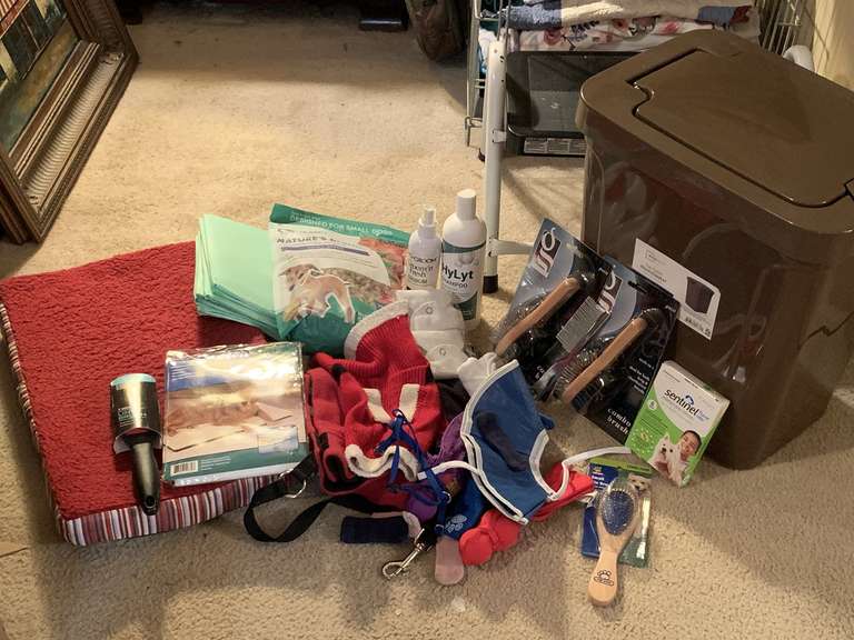 BROWN TRASH CAN/DOG FOOD CONTAINER FULL OF PET SUPPLIES TO INCLUDE NEW CRATE LINER, DR MARTIN DOG FOOD, DOG SWEATERS & MORE - UP MASTER CLOSET 1 image