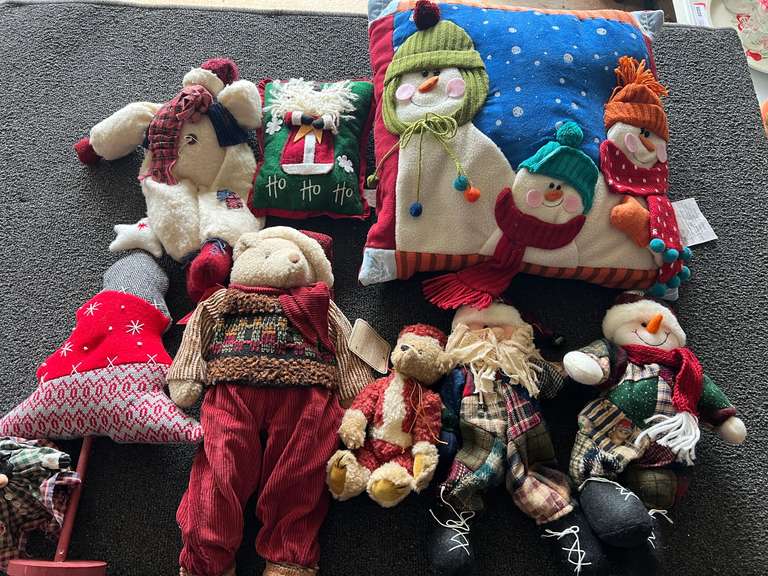 Assorted Christmas decor to include stuffed snowman, Santa, Christmas pillows, and more. See pictures for details. image