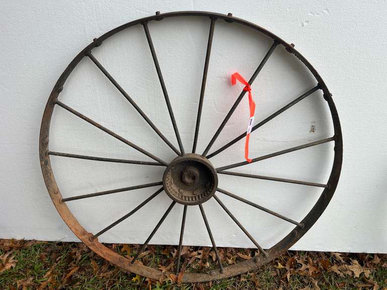 Antique metal wagon wheel image