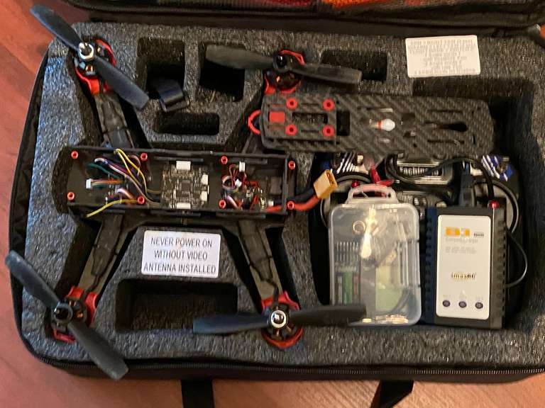 BR1…Partially assembled drone with storage case, assorted parts, and more. See pictures for details. image